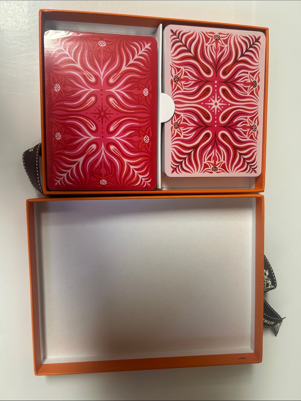 Hermes brand new playing cards. Sealed and comes with box and ribbon